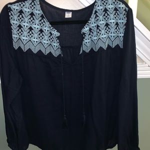 Navy blue shirt with light blue embroidery